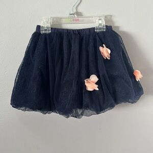 Girls tulle skirt with pink flowers.